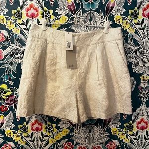 NWT: Joie women’s (10) Creamy-white colored embroidered side zip shorts.